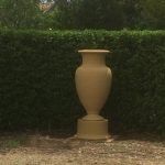 Large terracotta urn in garden